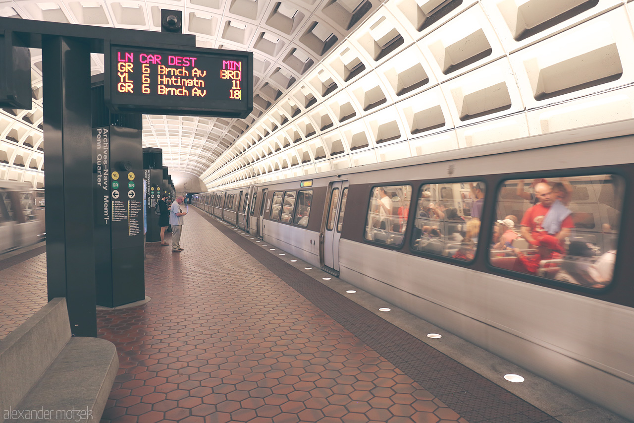 Foto von The bustling heart of D.C., capturing the sleek movements of the Washington Metro as passengers commute through iconic architecture.